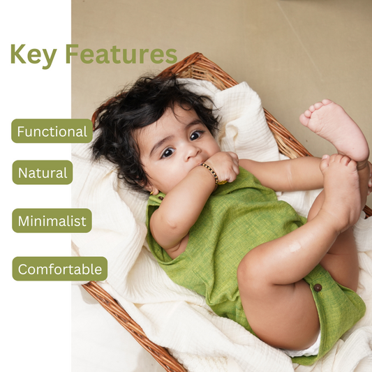 Photo highlighting key features of cotton baby romper for newborns and infants
