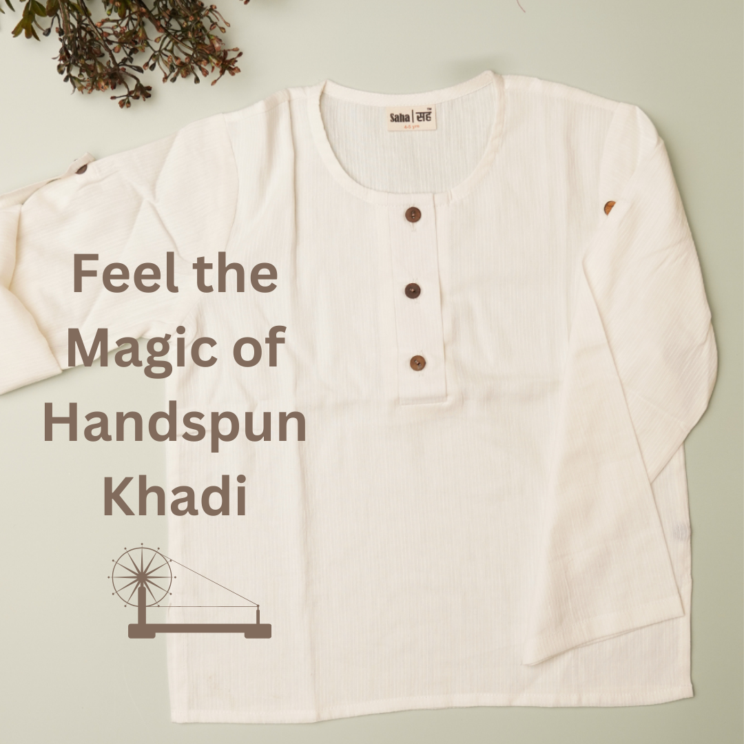 White shirt with text 'Feel the Magic of Handspun Khadi' on a light green background