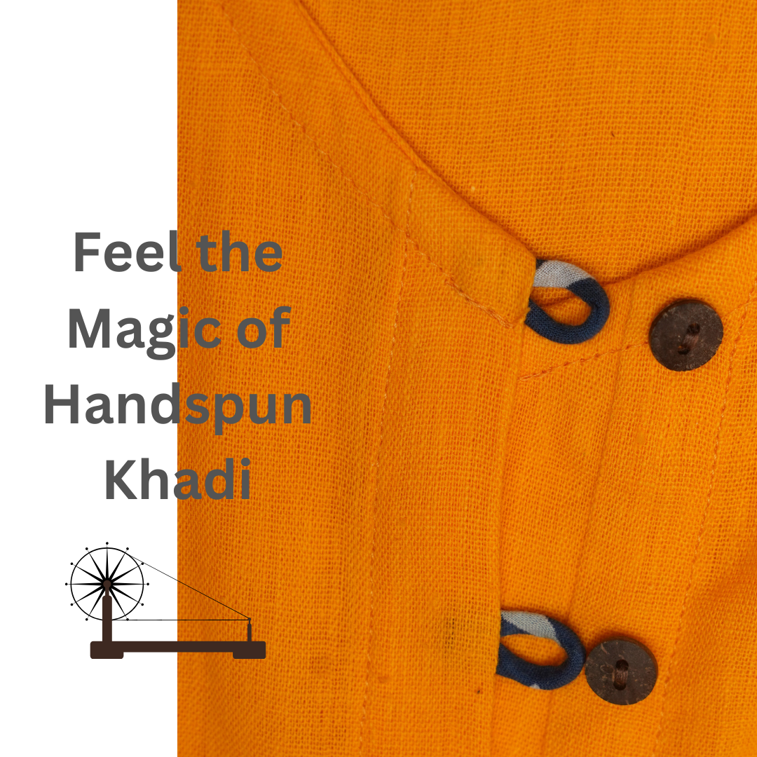 Close-up of orange fabric with buttons and text 'Feel the Magic of Handspun Khadi' on a white background.