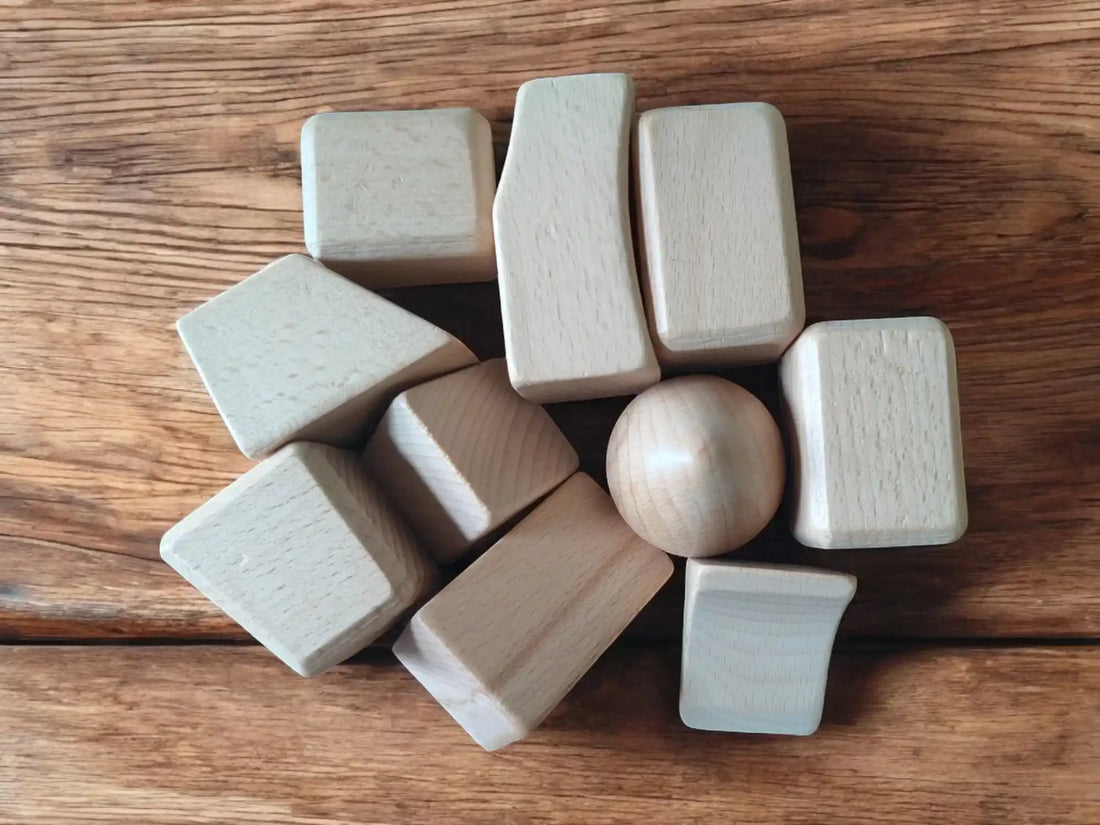 Natural wooden building blocks set for kids on wooden table, Montessori educational toy