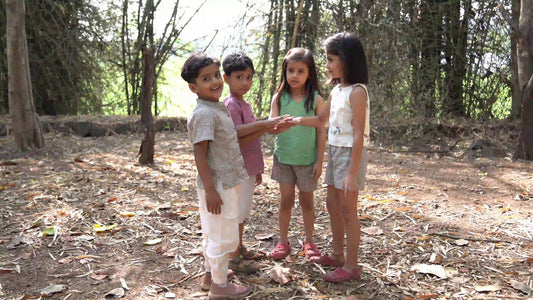 Children playing outside in the garden
