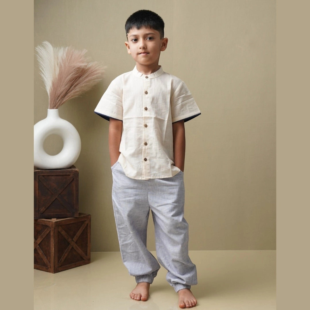 Boy wearing cotton piped shirt