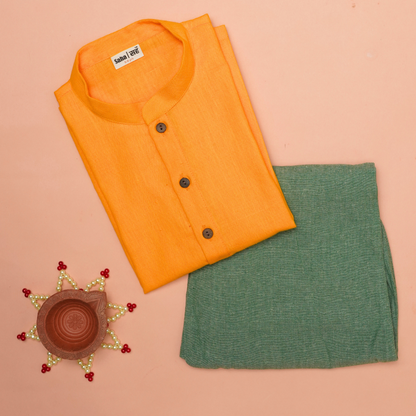 Yellow kurta and green pants set on a peach background with decorative elements.