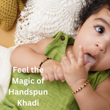 Close up of soft pure cotton fabric used in Tiny Sprout baby romper – breathable texture