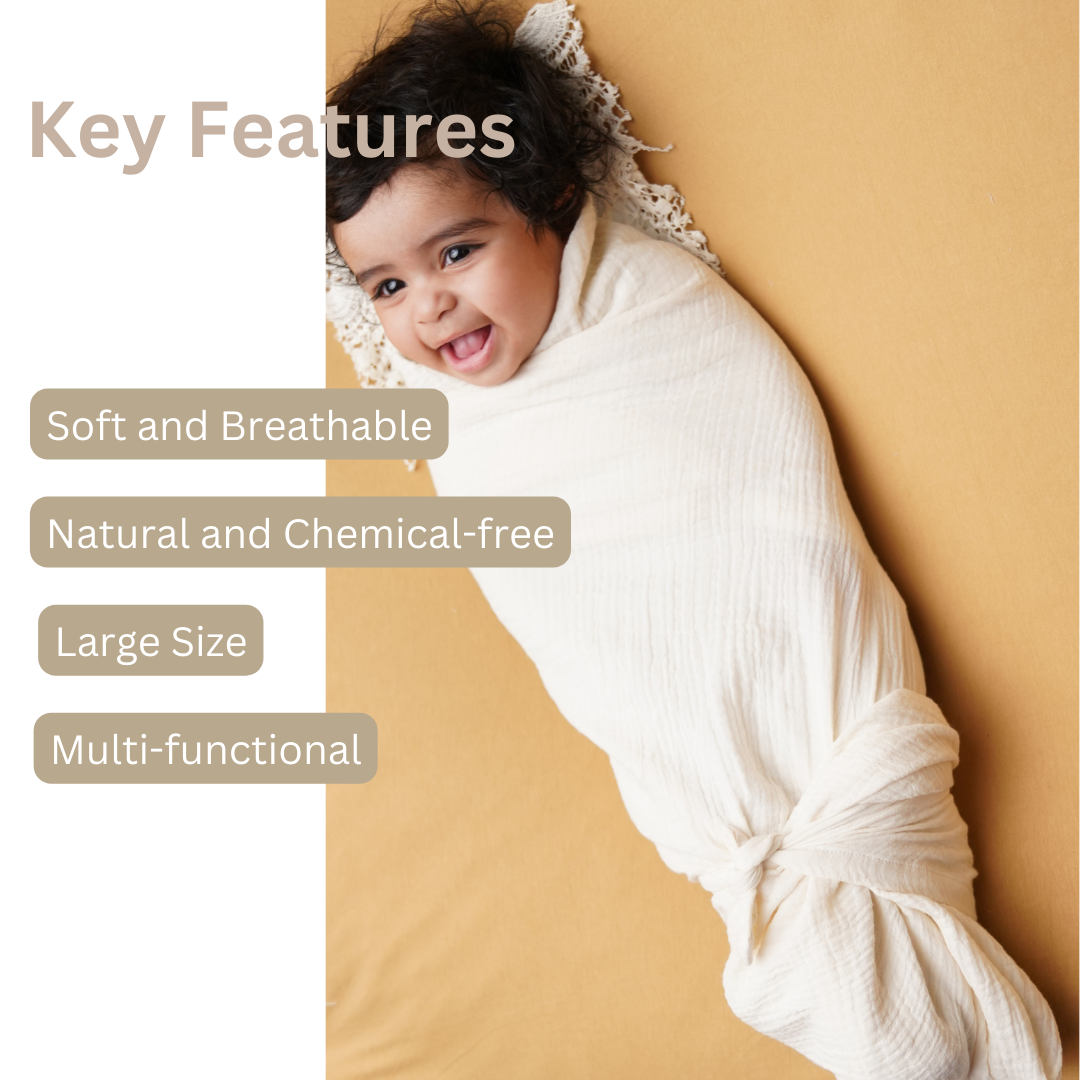 Baby wrapped in GOTS certified Muslin Swaddles with text highlighting key features on a beige background