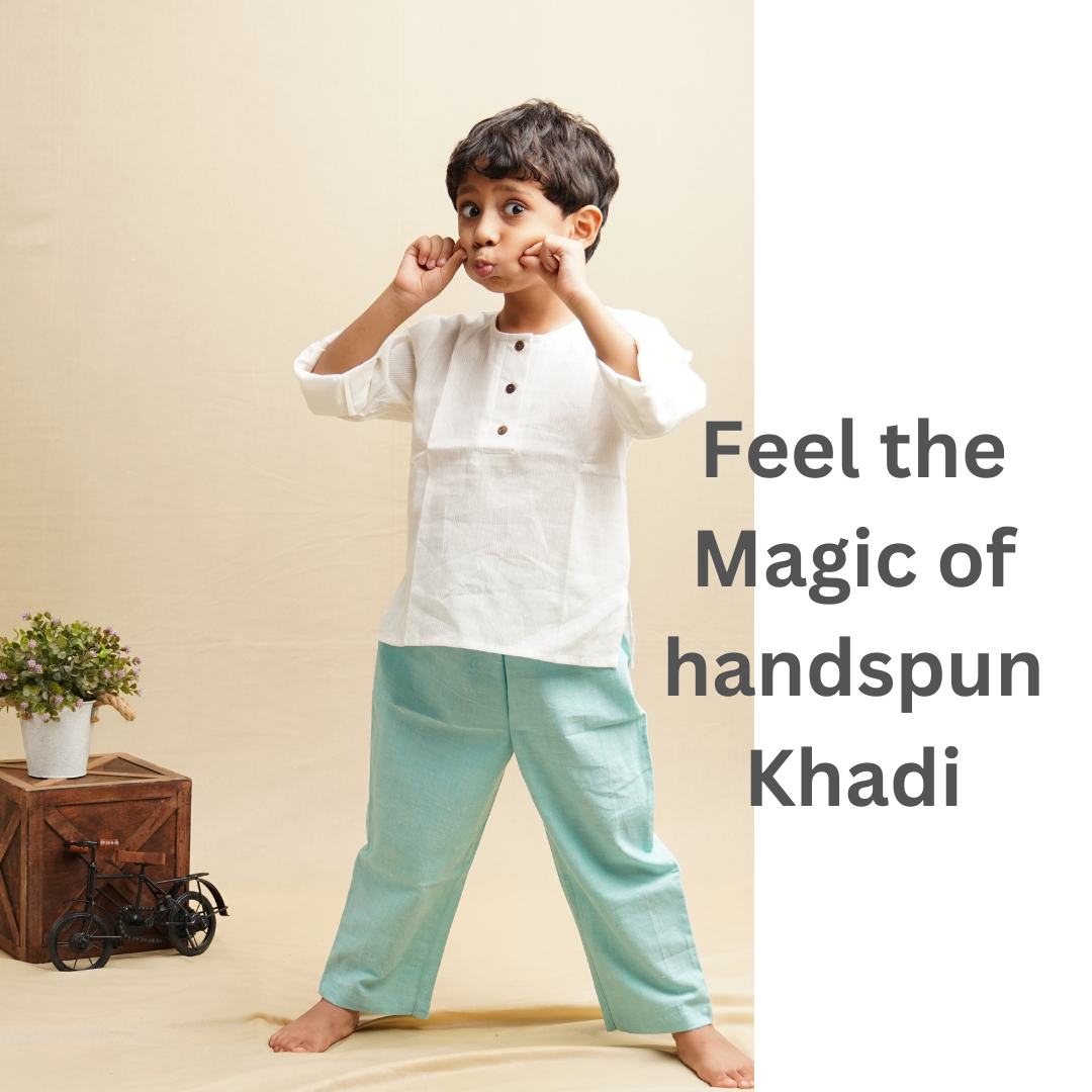 Boy wearing shirt and pants in pure cotton standing against beige background