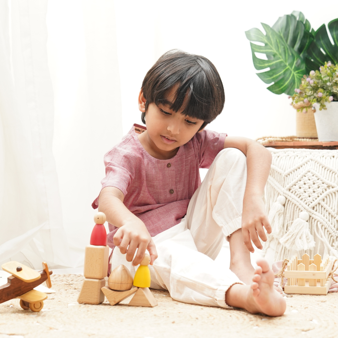 Child wearing comfortable cotton clothes and playing 