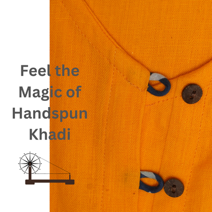 Close-up of orange fabric with buttons and text 'Feel the Magic of Handspun Khadi' on a white background.