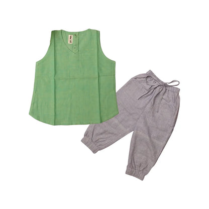 Flat lay of baby girl dress top and bottom set in cotton khadi – breathable natural toddler outfit