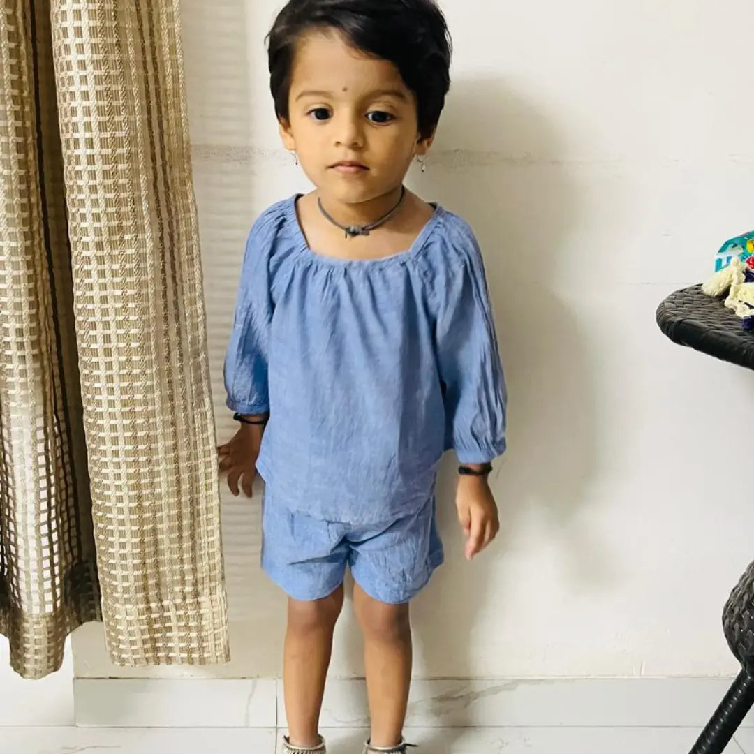 girl wearing a blue cotton coord set