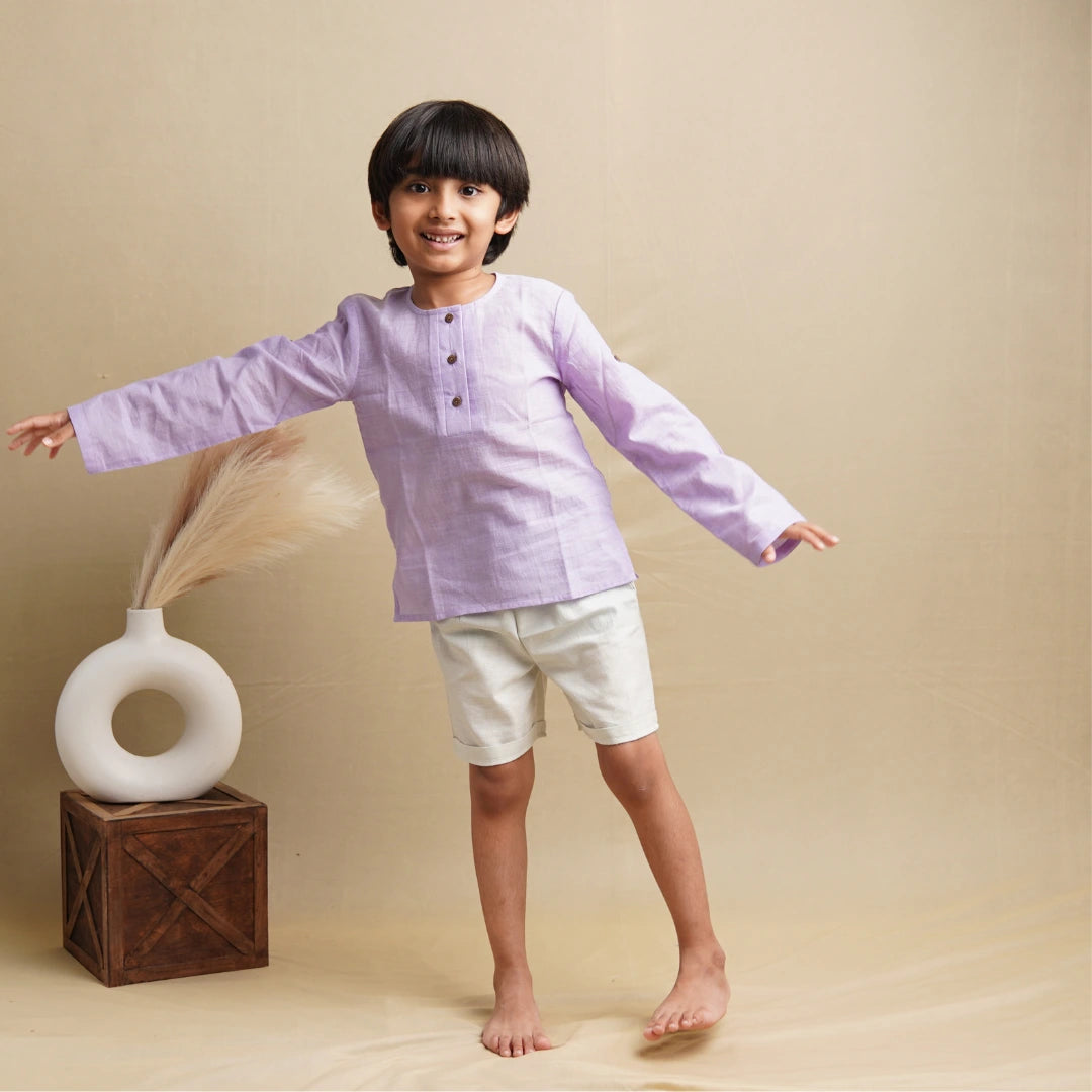 Boy wearing full sleeve shirt and shorts set – comfortable outfit for play and outings