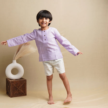 Boy wearing full sleeve shirt and shorts set – comfortable outfit for play and outings