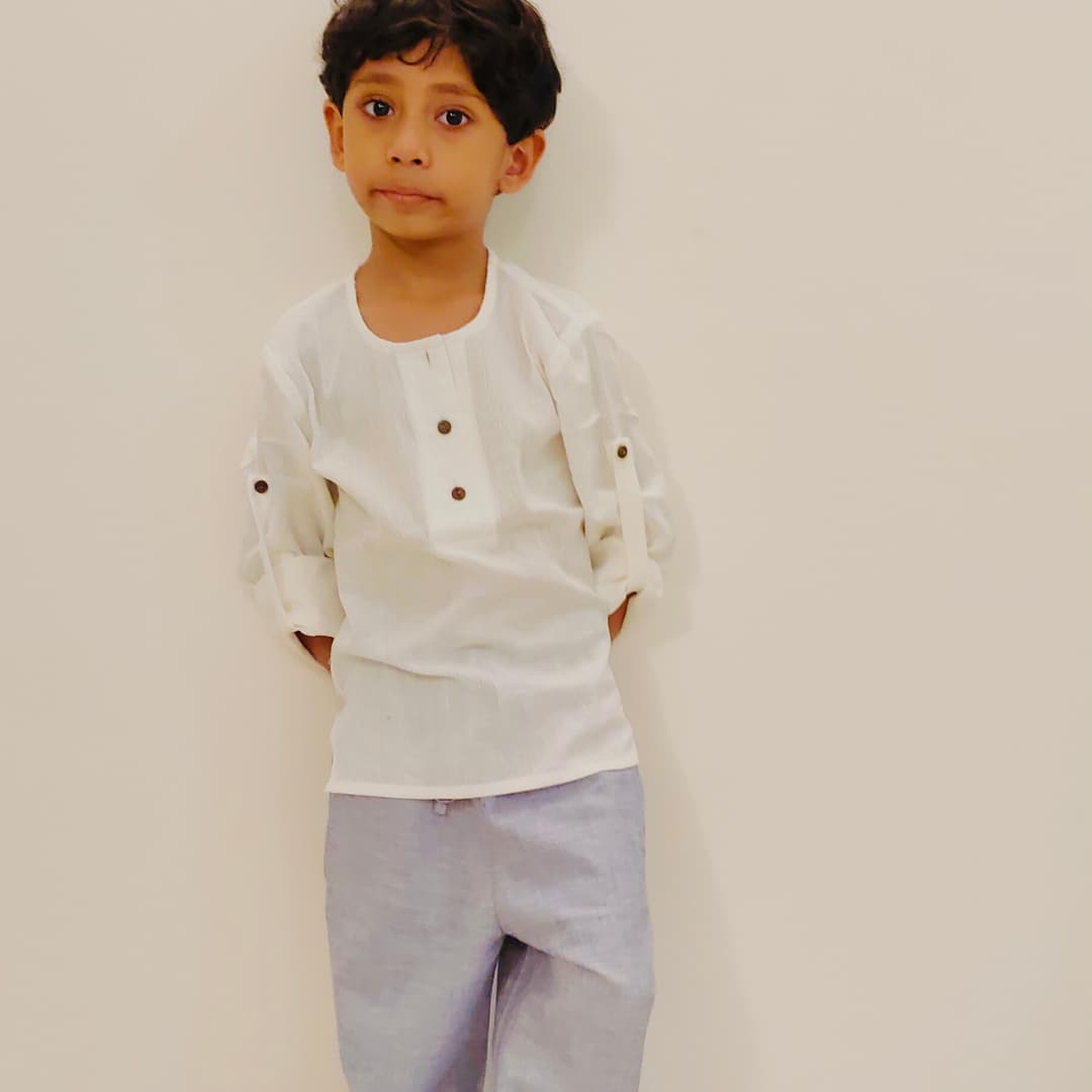 Boy wearing khadi shirt and cotton joggers set – breathable everyday outfit for kids