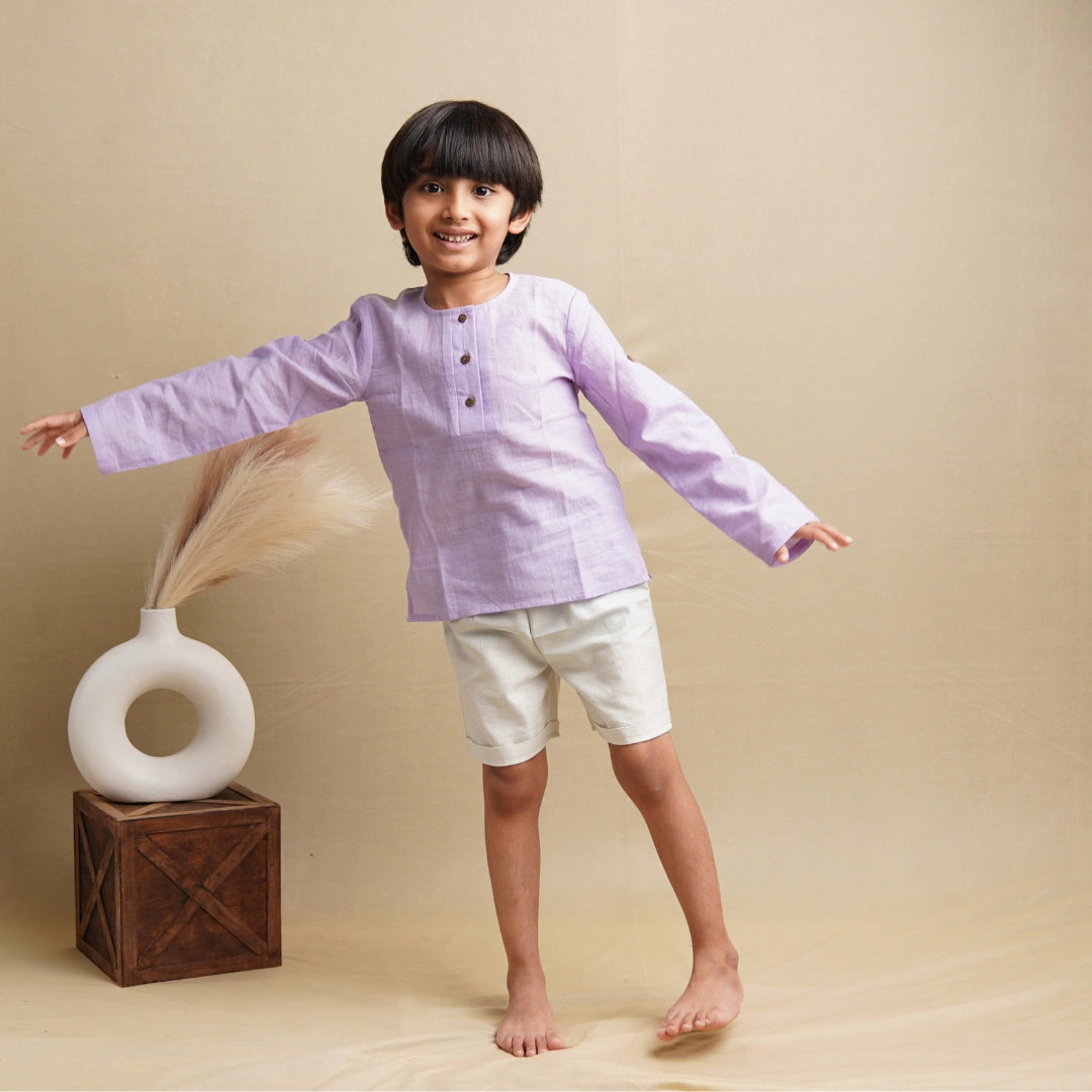Boy wearing Terra Trotters pure cotton shorts – breathable everyday outfit for kids