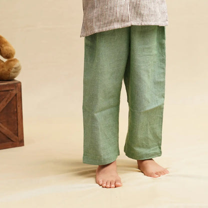 Close-up of green khadi trousers from a boys clothing set