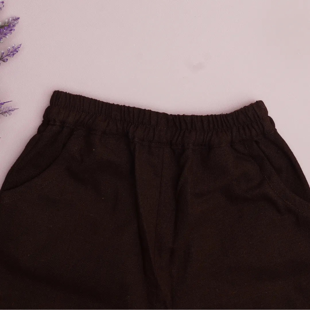 Close-up of elastic waistband and pockets on breathable khadi cotton pants for kids