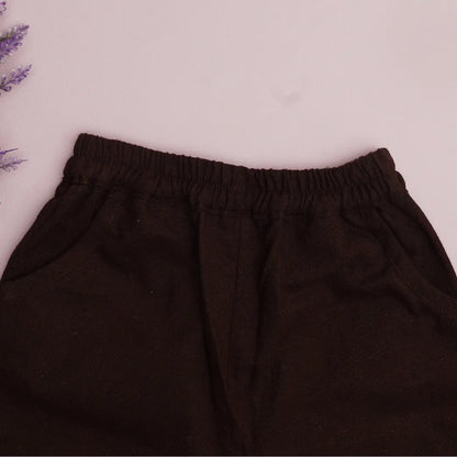 Close-up of elastic waistband and pockets on breathable khadi cotton pants for kids