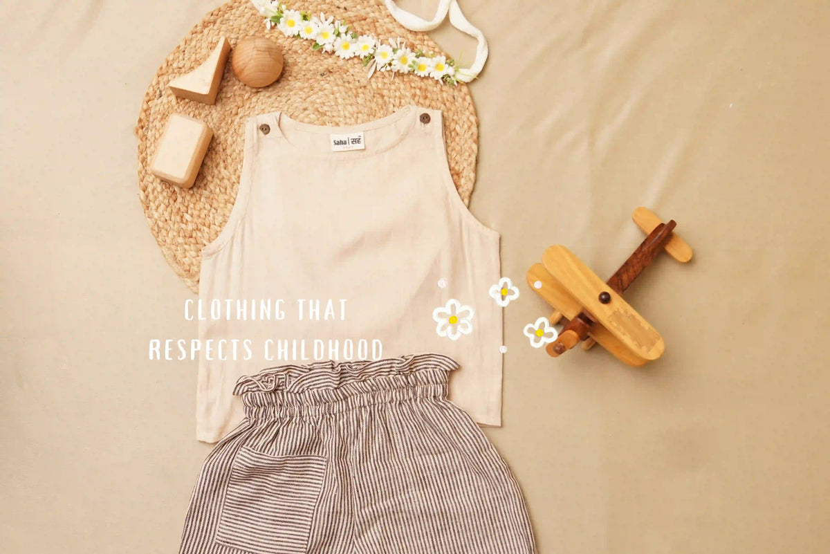 Flatlay of a girls clothing set in pure cotton