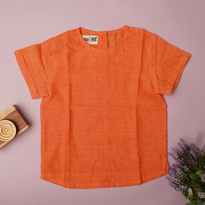 Flat lay of girls cotton kurti top – breathable everyday kids outfit