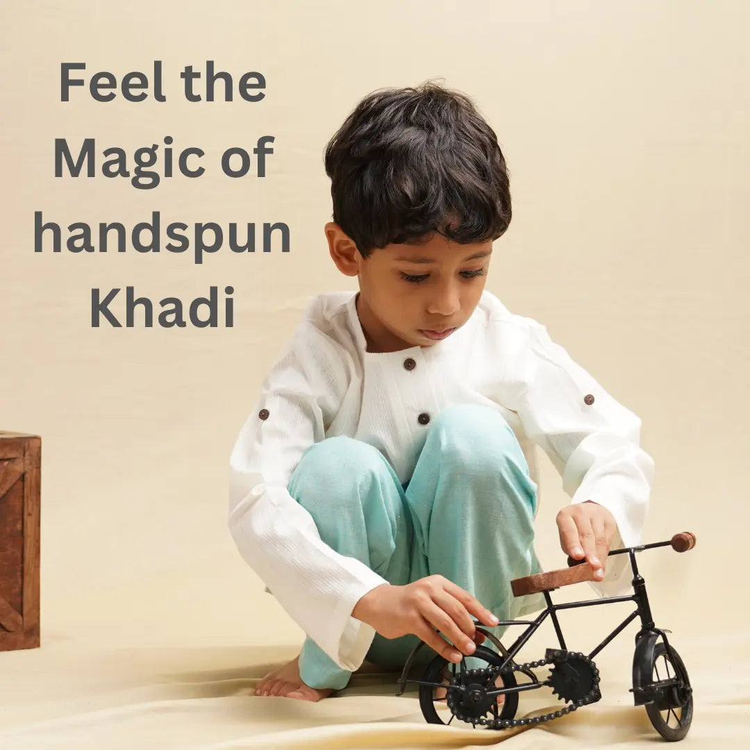 Child playing with a toy bike on a beige background with text about handspun Khadi.