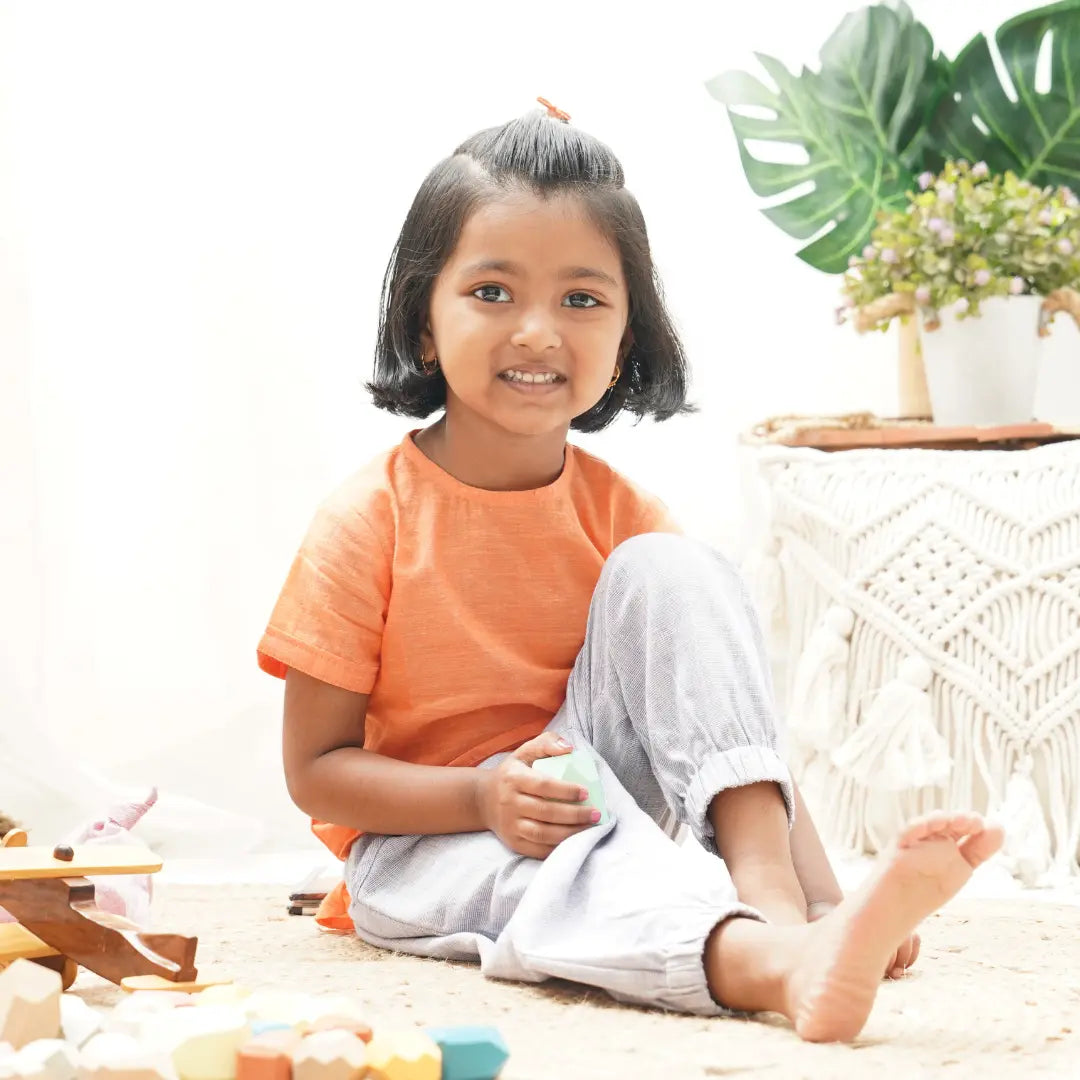 Close up of handwoven khadi cotton fabric used in Twilight baby girl summer set