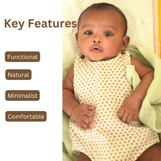 Minimalist khadi Cotton Onesie for babies featuring heart prints with key features like functional design, natural fabric, and comfort fit