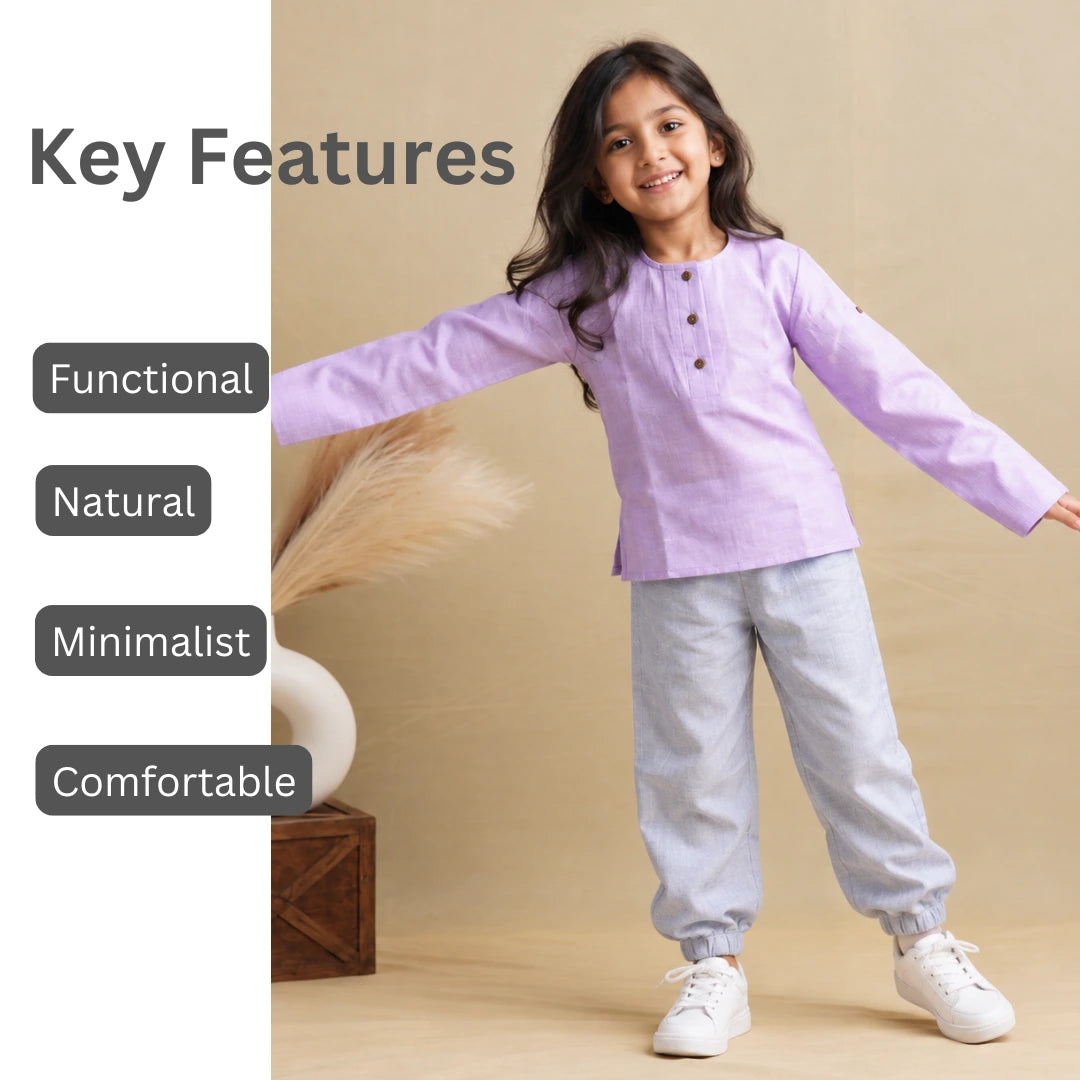 Girl in light purple unisex cotton kurta and joggers with key features: functional, natural, minimalist, comfortable