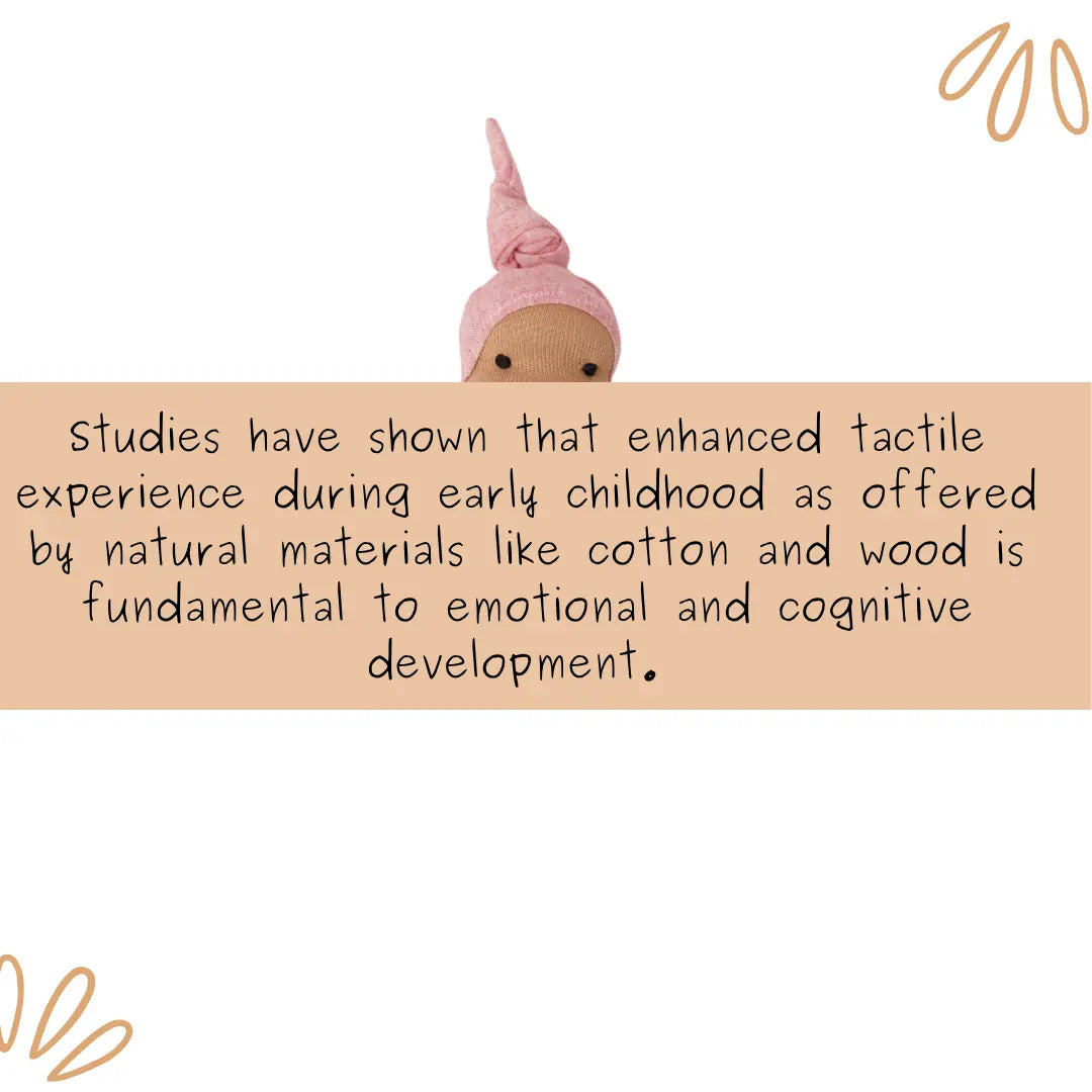 Pink Waldorf-inspired cuddle doll in soft natural fabric, highlighting the role of tactile experiences in early childhood play and development.