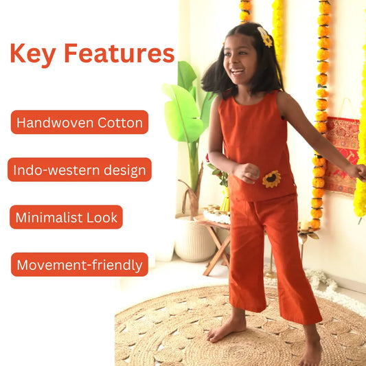 Girl dancing in a rust orange ikat coord set, with key features listed: handwoven cotton, Indo-western design, minimalist look, movement-friendly