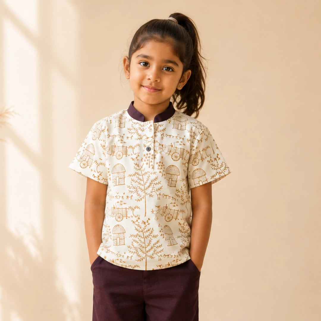 Girl wearing a Warli short kurta made from breathable khadi cotton