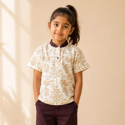 Girl wearing a Warli short kurta made from breathable khadi cotton