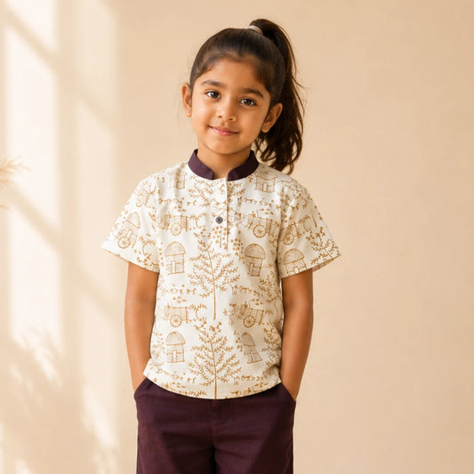 Girl wearing a Warli short kurta made from breathable khadi cotton